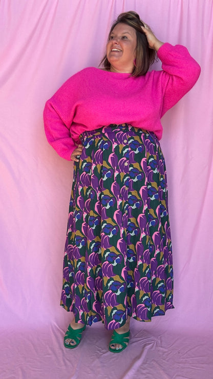 Ajoutez une touche de couleur vive et de douceur à votre dressing avec ce pull gilet grande taille en rose fuchsia éclatant en alpaga.