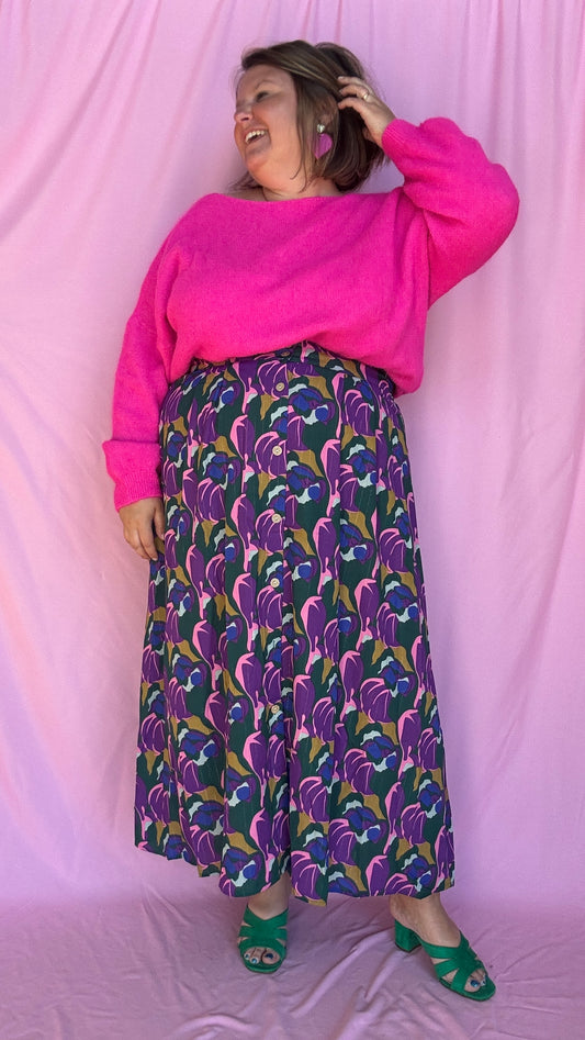 Ajoutez une touche de couleur vive et de douceur à votre dressing avec ce pull gilet grande taille en rose fuchsia éclatant en alpaga.